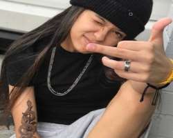 The star has a big tattoo on her forearm.